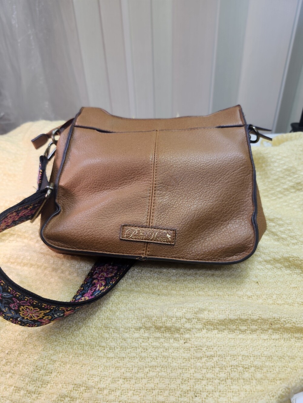 The Pioneer Woman Tan Pebble Leather Crossbody with Floral Strap